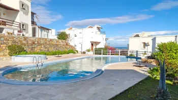 Выгодная вилла с тремя спальнями в Koyunbaba Bodrum